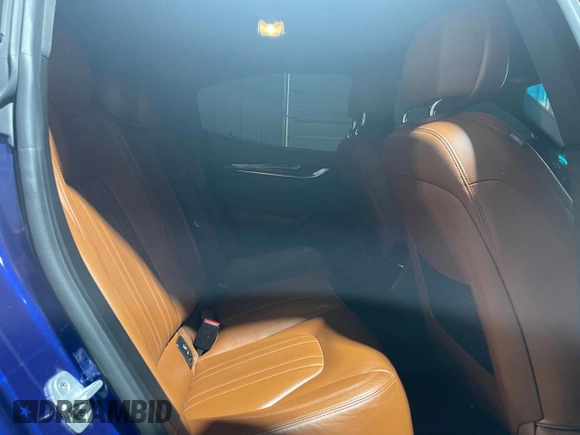 2014 Maserati Ghibli S Q4 z VIN ZAM57RTA0E1087454, wystawiony jako Copart lot #58608995 z przebiegiem 58 880 mil mil oraz Szkody całkowita. Historia ofert i sprzedaży dostępna na DreamBid. Obrazek 6.