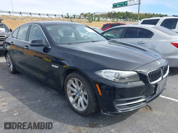 2014 BMW 5 Series 535i with VIN WBA5B1C54ED476763, listed as a IAAI auction lot 41590236 with 115,048 mi miles and . Bid and sale history available at DreamBid. Image 1.