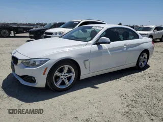 2015 BMW 4 Series 428i with VIN WBA3V7C59FP771861, listed as a Copart auction lot 56562525 with 64,273 mi miles and Salvage title. Bid and sale history available at DreamBid. Image 1.