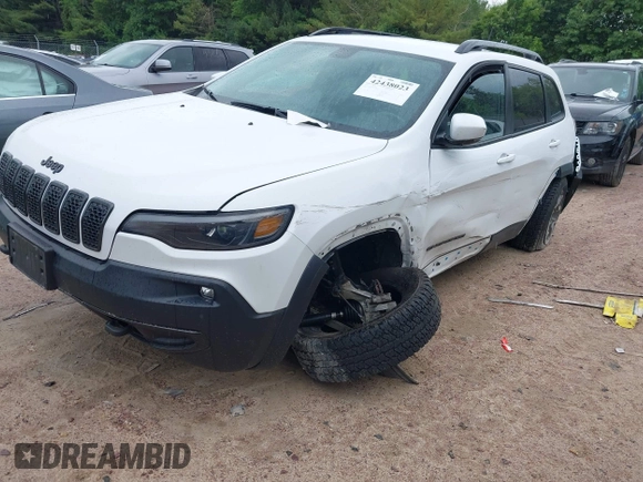 2020 Jeep Cherokee Latitude with VIN 1C4PJMCXXLD578180, listed as a IAAI auction lot 42438023 with 82,845 mi miles and . Bid and sale history available at DreamBid. Image 2.