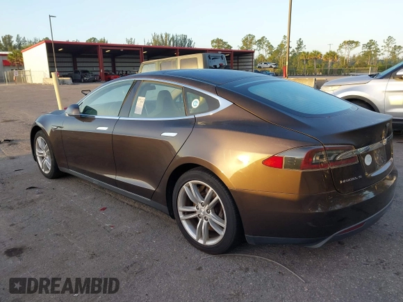 2014 Tesla Model S 60 z VIN 5YJSA1H19EFP51406, wystawiony jako IAAI lot #41561395 z przebiegiem Nie podano mil oraz . Historia ofert i sprzedaży dostępna na DreamBid. Obrazek 3.