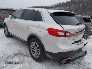 2016 Lincoln MKX Select with VIN 2LMTJ8KR3GBL31765, listed as a IAAI auction lot 41352530 with 155,376 mi miles. Bid and sale history available at carsss.com. Image 3.