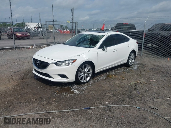 2016 Mazda Mazda6 i Touring with VIN JM1GJ1V56G1448334, listed as a IAAI auction lot 42075222 with 52,883 mi miles. Bid and sale history available at carsss.com. Image 2.