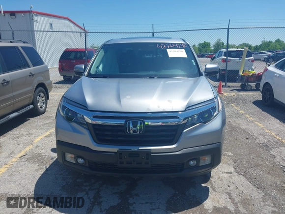 2020 Honda Ridgeline RTL with VIN 5FPYK3F5XLB019296, listed as a IAAI auction lot 42204290 with 48,197 mi miles and . Bid and sale history available at DreamBid. Image 12.