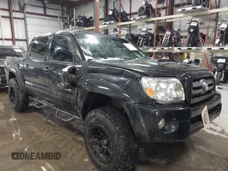 2009 Toyota Tacoma with VIN 3TMLU42N79M027885, listed as a IAAI auction lot 41146330 with 261,832 mi miles and . Bid and sale history available at DreamBid. Image 6.