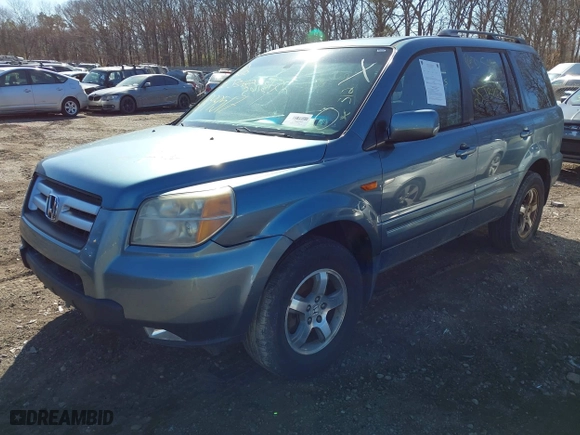 2006 Honda Pilot EX-L with VIN 5FNYF18536B017084, listed as a IAAI auction lot 41899517 with 999,999 mi miles. Bid and sale history available at carsss.com. Image 2.