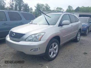 2007 Lexus RX 350 with VIN 2T2GK31U07C023916, listed as a IAAI auction lot 42026162 with 168,099 mi miles. Bid and sale history available at carsss.com. Image 2.