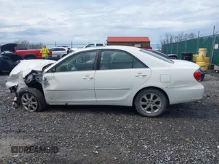 2005 Toyota Camry LE with VIN JTDBF30KX50165586, listed as a IAAI auction lot 41948322 with 84,326 mi miles and . Bid and sale history available at DreamBid. Image 14.