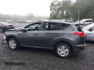 2015 Toyota RAV4 LE with VIN JTMBFREV4FD153207, listed as a IAAI auction lot 42518542 with 56,505 mi miles and . Bid and sale history available at DreamBid. Image 14.