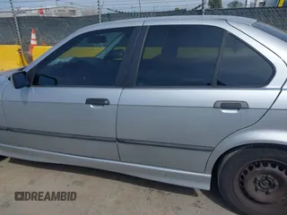 1997 BMW 3 Series 318iA with VIN WBACC0322VEK25478, listed as a IAAI auction lot 42033040 with 212,320 mi miles. Bid and sale history available at carsss.com. Image 14.