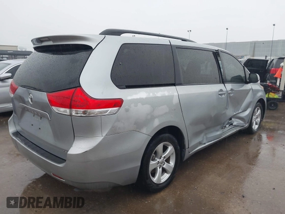 2014 Toyota Sienna LE AAS with VIN 5TDKK3DC9ES501255, listed as a IAAI auction lot 42096386 with 347,364 mi miles and . Bid and sale history available at carsss.com. Image 4.