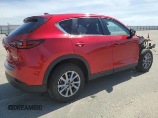 2023 Mazda CX-5 2.5 S Preferred Package with VIN JM3KFBCMXP0184897, listed as a Copart auction lot 50264135 with 28,556 mi miles and Salvage Title. Bid and sale history available at carsss.com. Image 3.