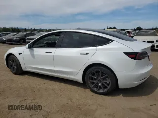 2023 Tesla Model 3 с VIN 5YJ3E1EA7PF452786, выставлен на аукционе Copart как лот 52570005 с пробегом 61 492 миль миль и Списание • Salvage title. История ставок и продаж доступна на DreamBid. Изображение 2.