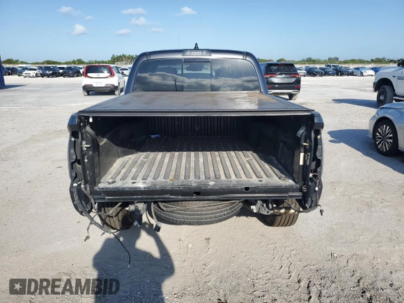 2020 Toyota Tacoma SR5 with VIN 3TMAZ5CN9LM125157, listed as a Copart auction lot 57178885 with 59,830 mi miles and Salvage title. Bid and sale history available at DreamBid. Image 6.