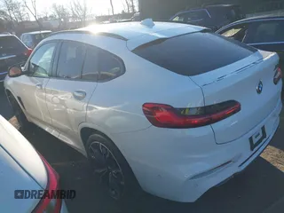 2021 BMW X4 M with VIN 5YMUJ0C02M9H67919, listed as a IAAI auction lot 41667578 with 43,567 mi miles. Bid and sale history available at carsss.com. Image 3.