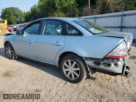 2008 Ford Taurus SEL with VIN 1FAHP24W68G187312, listed as a Copart auction lot 62879765 with 154,706 mi miles and Salvage title. Bid and sale history available at DreamBid. Image 2.