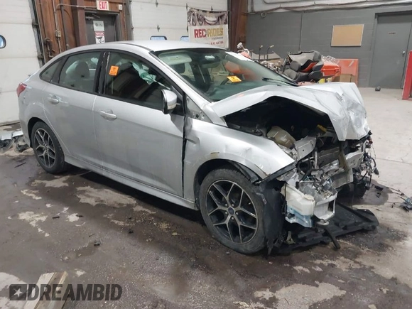 2015 Ford Focus SE with VIN 1FADP3F24FL272863, listed as a IAAI auction lot 41561084 with 103,875 mi miles. Bid and sale history available at carsss.com. Image 1.