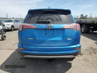 2018 Toyota RAV4 XLE with VIN 2T3WFREV8JW407501, listed as a Copart auction lot 54239815 with Not Provided miles and Salvage Title. Bid and sale history available at DreamBid. Image 6.