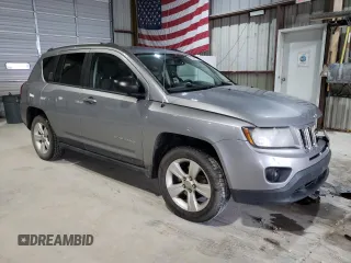 2016 Jeep Compass Sport with VIN 1C4NJCBA1GD512864, listed as a Copart auction lot 56297115 with 216,693 mi miles and Salvage title. Bid and sale history available at DreamBid. Image 4.
