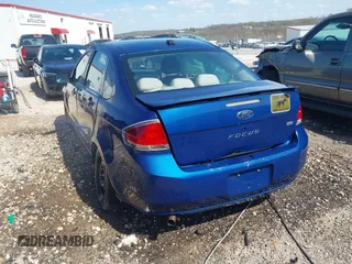 2009 Ford Focus SE with VIN 1FAHP35N59W257031, listed as a IAAI auction lot 41887905 with 192,591 mi miles. Bid and sale history available at carsss.com. Image 3.