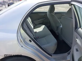 2009 Toyota Corolla with VIN 1NXBU40E49Z017630, listed as a IAAI auction lot 42204714 with 176,828 mi miles. Bid and sale history available at carsss.com. Image 8.