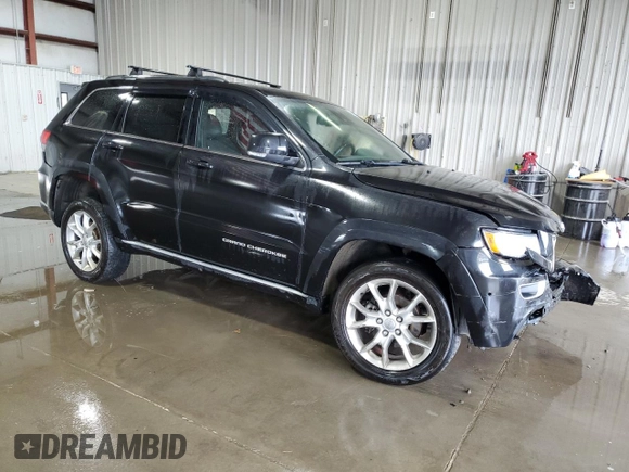 2015 Jeep Grand Cherokee Summit with VIN 1C4RJFJG0FC685241, listed as a Copart auction lot 56122505 with 112,516 mi miles and Salvage title. Bid and sale history available at DreamBid. Image 4.