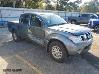 2018 Nissan Frontier S with VIN 1N6DD0ER0JN703709, listed as a Copart auction lot 76940614 with 86,782 mi miles and Salvage Title. Bid and sale history available at carsss.com. Image 4.