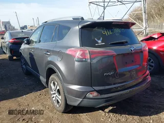 2016 Toyota RAV4 LE with VIN JTMBFREV1GJ085659, listed as a IAAI auction lot 41823575 with 141,657 mi miles. Bid and sale history available at carsss.com. Image 3.
