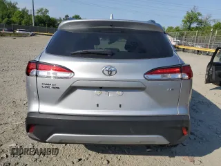 2022 Toyota Corolla Cross LE with VIN 7MUCAAAG4NV008835, listed as a Copart auction lot 55262205 with 13,332 mi miles and Salvage title. Bid and sale history available at DreamBid. Image 6.