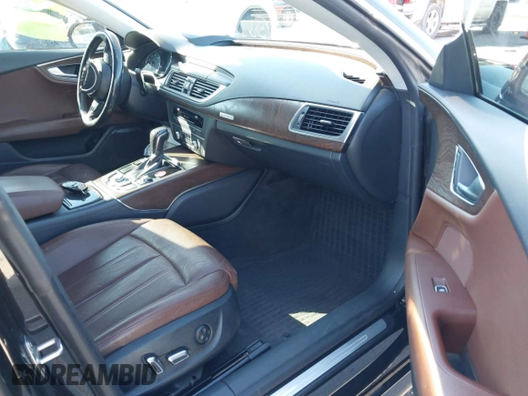 2016 Audi A7 Prestige z VIN WAU2GAFC5GN169534, wystawiony jako IAAI lot #40802384 z przebiegiem 103 263 mil mil oraz . Historia ofert i sprzedaży dostępna na DreamBid. Obrazek 5.