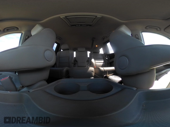 2012 Honda Odyssey Touring with VIN 5FNRL5H92CB108690, listed as a IAAI auction lot 41826580 with 150,327 mi miles and . Bid and sale history available at DreamBid. Image 19.