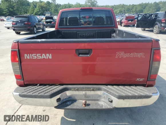 2000 Nissan Frontier XE with VIN 1N6DD26SXYC393054, listed as a Copart auction lot 62410125 with 106,319 mi miles and Salvage title. Bid and sale history available at DreamBid. Image 6.