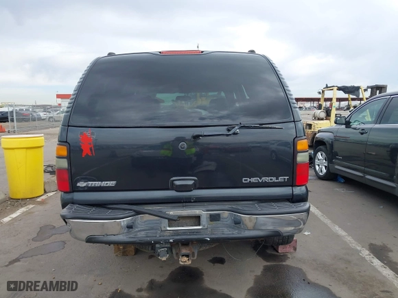 2004 Chevrolet Tahoe LT with VIN 1GNEK13T54J146851, listed as a IAAI auction lot 41990571 with 172,025 mi miles. Bid and sale history available at carsss.com. Image 16.