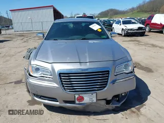 2014 Chrysler 300 C with VIN 2C3CCAKG6EH379114, listed as a IAAI auction lot 41992957 with 151,949 mi miles and . Bid and sale history available at carsss.com. Image 13.