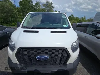 2021 Ford Transit Cargo with VIN 1FTBR2YG3MKA85227, listed as a IAAI auction lot 42678741 with 122,360 mi miles and . Bid and sale history available at DreamBid. Image 19.