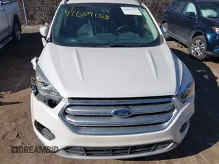 2017 Ford Escape SE z VIN 1FMCU9GD6HUB41900, wystawiony jako IAAI lot #41689153 z przebiegiem 85 975 mil mil oraz . Historia ofert i sprzedaży dostępna na DreamBid. Obrazek 12.