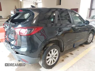 2016 Mazda CX-5 Touring with VIN JM3KE2CY7G0867355, listed as a IAAI auction lot 41963169 with 117,727 mi miles and . Bid and sale history available at DreamBid. Image 4.