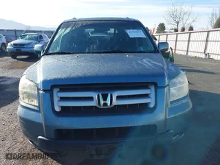 2006 Honda Pilot EX-L with RES with VIN 2HKYF18666H511059, listed as a IAAI auction lot 41719613 with 143,084 mi miles. Bid and sale history available at carsss.com. Image 12.