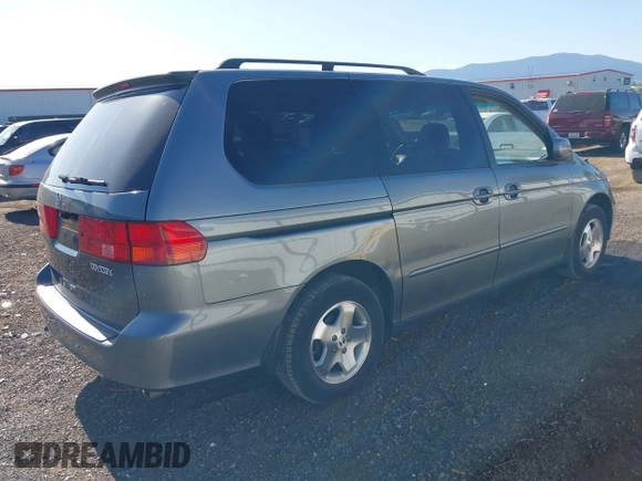1999 Honda Odyssey EX with VIN 2HKRL1868XH534664, listed as a IAAI auction lot 42650005 with 96,229 mi miles and . Bid and sale history available at DreamBid. Image 4.