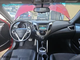 2015 Hyundai Veloster with VIN KMHTC6AD0FU238274, listed as a Copart auction lot 82464584 with 14,312 mi miles and Clean Title. Bid and sale history available at carsss.com. Image 9.