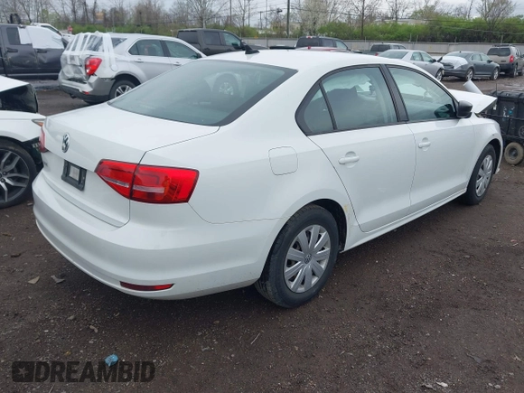 2015 Volkswagen Jetta Sedan 2.0L S with VIN 3VW2K7AJ5FM313969, listed as a IAAI auction lot 41951550 with 104,735 mi miles. Bid and sale history available at carsss.com. Image 4.