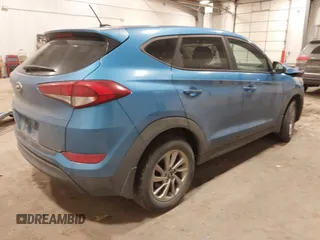 2017 Hyundai Tucson SE with VIN KM8J23A41HU395629, listed as a IAAI auction lot 41340592 with 119,568 mi miles. Bid and sale history available at carsss.com. Image 4.