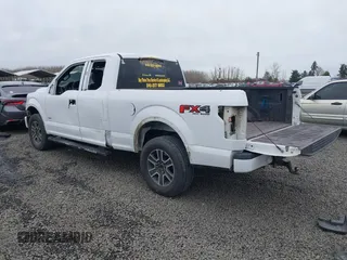 2015 Ford F-150 XLT with VIN 1FTEX1EP1FFA21653, listed as a IAAI auction lot 41597518 with 153,111 mi miles and . Bid and sale history available at DreamBid. Image 3.