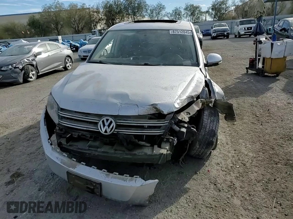 2013 Volkswagen Tiguan S with VIN WVGAV3AX8DW559779, listed as a Copart auction lot 87512845 with 79,169 mi miles and Salvage title. Bid and sale history available at DreamBid. Image 11.