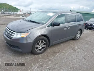 2012 Honda Odyssey EX-L with VIN 5FNRL5H68CB060487, listed as a IAAI auction lot 42176223 with 234,078 mi miles and . Bid and sale history available at DreamBid. Image 18.