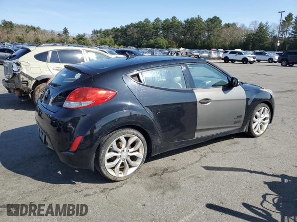 2013 Hyundai Veloster w/Black Int z VIN KMHTC6AD5DU173029, wystawiony jako Copart lot #52587455 z przebiegiem 161 716 mil mil oraz Czysty tytuł • Clean title. Historia ofert i sprzedaży dostępna na DreamBid. Obrazek 3.