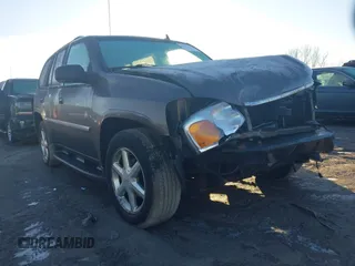 2008 GMC Envoy SLE2 with VIN 1GKDT13S182237645, listed as a IAAI auction lot 41454212 with 195,483 mi miles. Bid and sale history available at carsss.com. Image 1.