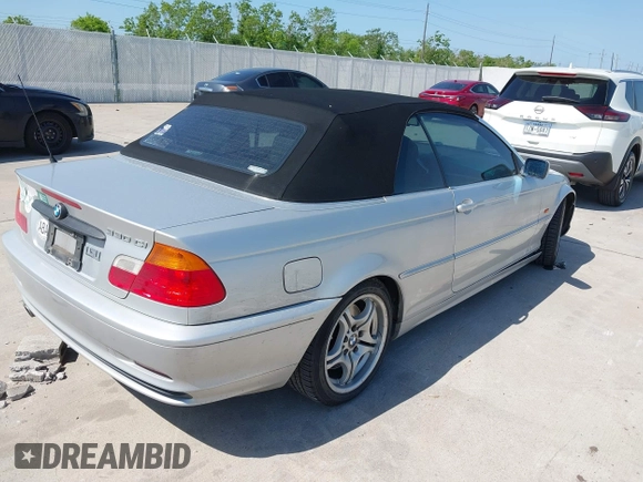 2001 BMW 3 Series 330Ci with VIN WBABS53431EV86967, listed as a IAAI auction lot 42017677 with 198,944 mi miles. Bid and sale history available at carsss.com. Image 4.