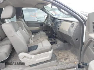 2009 Ford F-150 STX with VIN 1FTRX12W59KB75341, listed as a IAAI auction lot 42045577 with 195,427 mi miles and . Bid and sale history available at DreamBid. Image 5.