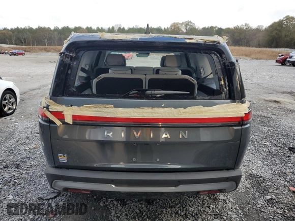2023 Rivian R1S Launch Edition z VIN 7PDSGABL9PN022280, wystawiony jako Copart lot #83526124 z przebiegiem 51 mil mil oraz Szkoda całkowita • Salvage title. Historia ofert i sprzedaży dostępna na DreamBid. Obrazek 6.